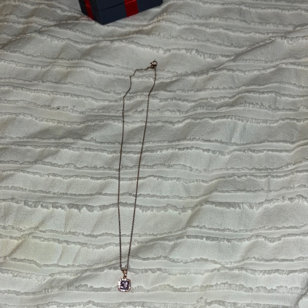 Elegant Gold Necklace with Purple Gemstone Pendant